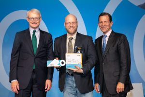 TCG President Daniel Turner accepts the ICIC Inner City 100 award. 